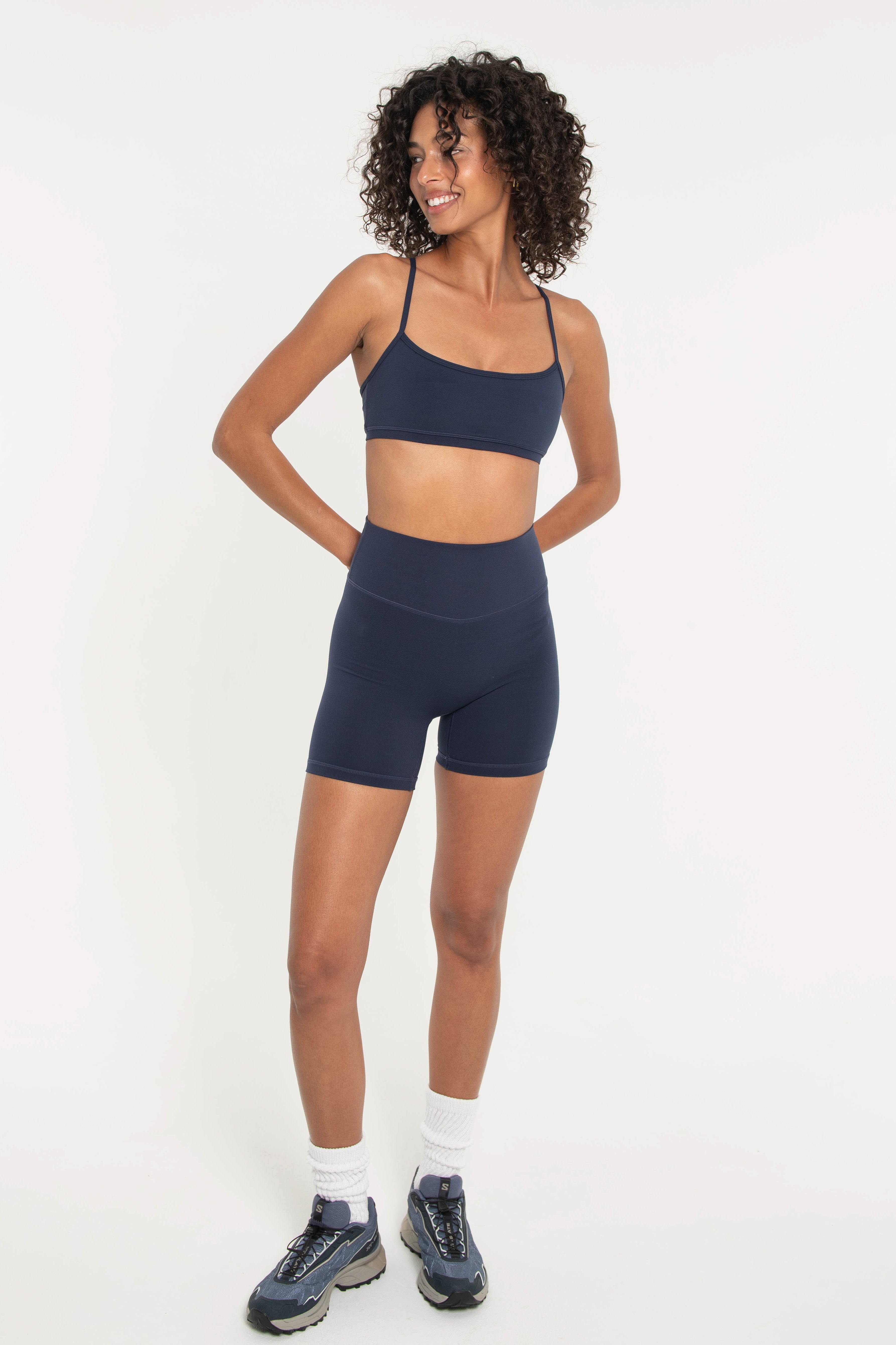 Y back navy sports bra with thin straps and scoop neck